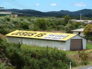 Rural sign that reads like a warning.