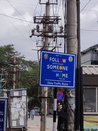 A Sign That Looks Like it Says "follow Someone Home" from Reddit r/CrappyDesign.