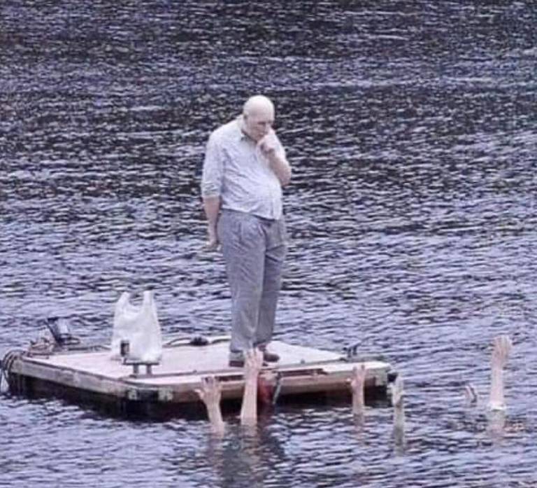 Lone white figure in a cold open scene.