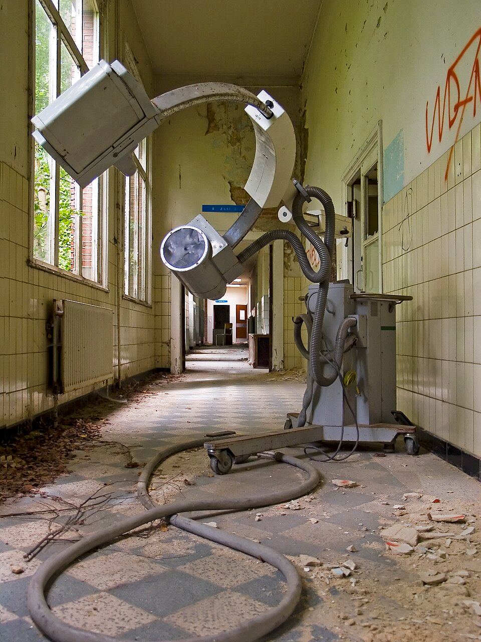 A large medical machine with a head opening in an abandoned Antwerp hospital.